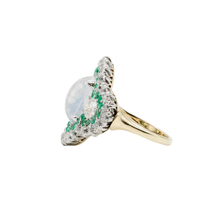 Edwardian Platinum Topped 18K Gold Moonstone Ring with Emeralds