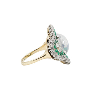 Edwardian Platinum Topped 18K Gold Moonstone Ring with Emeralds