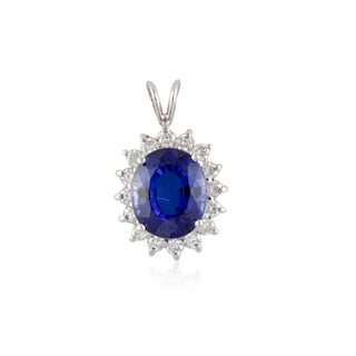 Estate 18K White Gold Tanzanite Starburst Pendant
