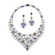 Load image into Gallery viewer, Sterling Silver and Gold Carved Moonstone and Tanzanite Necklace and Earrings
