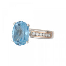 Load image into Gallery viewer, Estate Platinum and 14K Rose Gold Blue Topaz Ring
